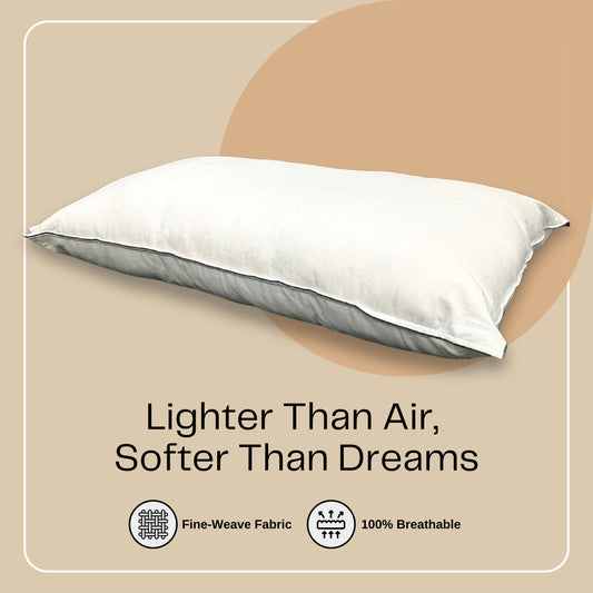 A luxurious king size pillow with a fine-weave fabric cover, designed for breathability and comfort. The image features a soft, plush pillow against a beige background with the text 'Lighter Than Air, Softer Than Dreams.' Icons highlight key features, including fine-weave fabric and 100% breathability, emphasizing its lightweight and airy feel.