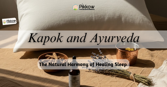 A peaceful bedroom with natural Kapok pillows and Ayurvedic bedding by Pikkow, symbolizing holistic sleep balance and organic healing comfort.
